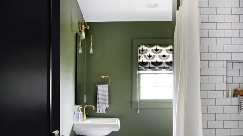 green bathroom idea with white subway tile shower