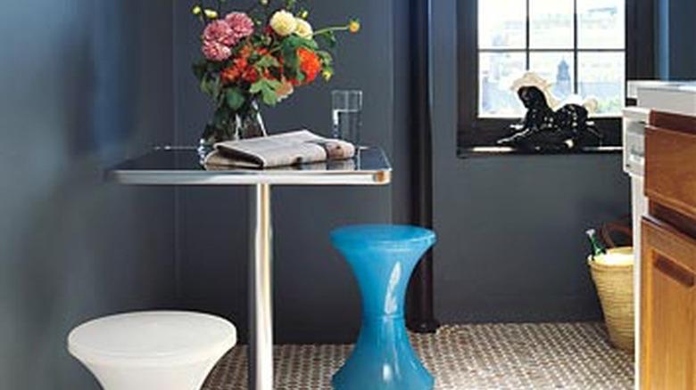 blue bathroom with round cork penny tile flooring