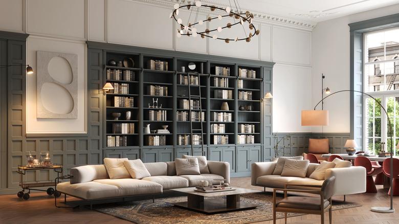 living room with library bookshelves