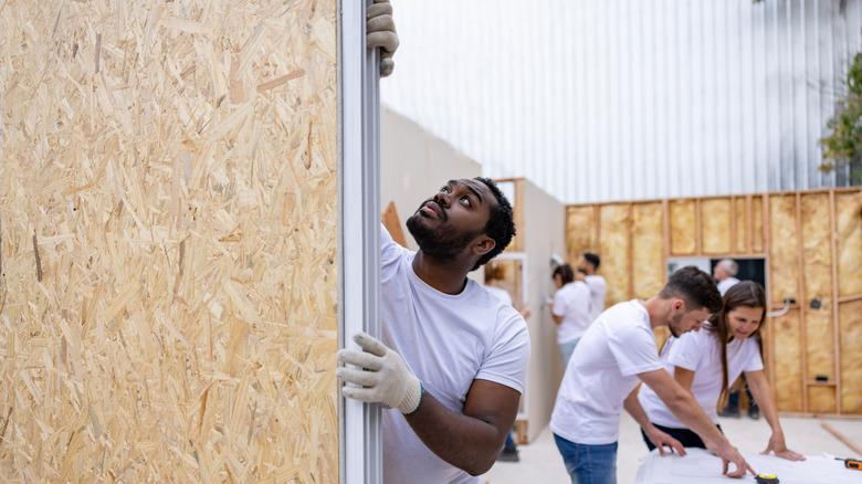 Habitat for Humanity volunteers building a house