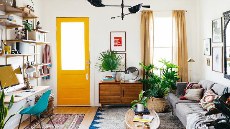 living room with yellow front door