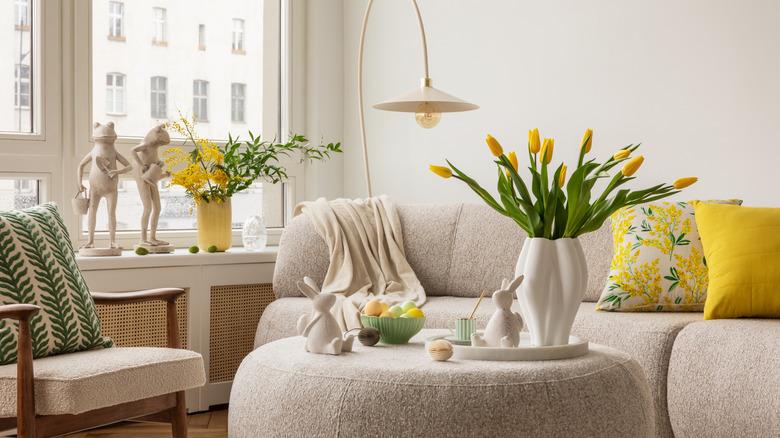 yellow accents in white living room