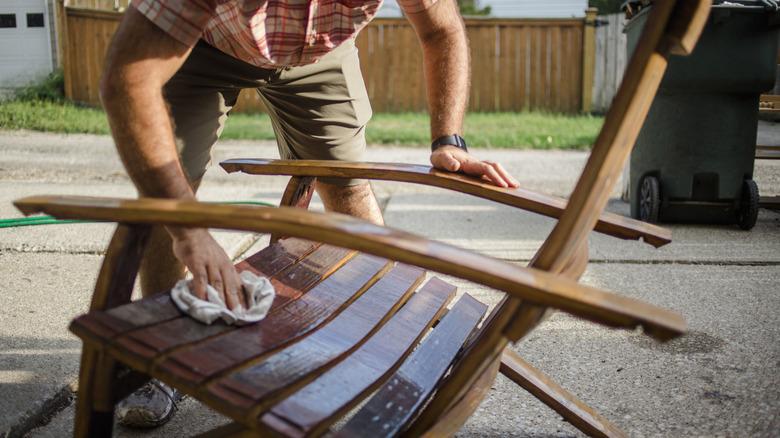 man applying polish