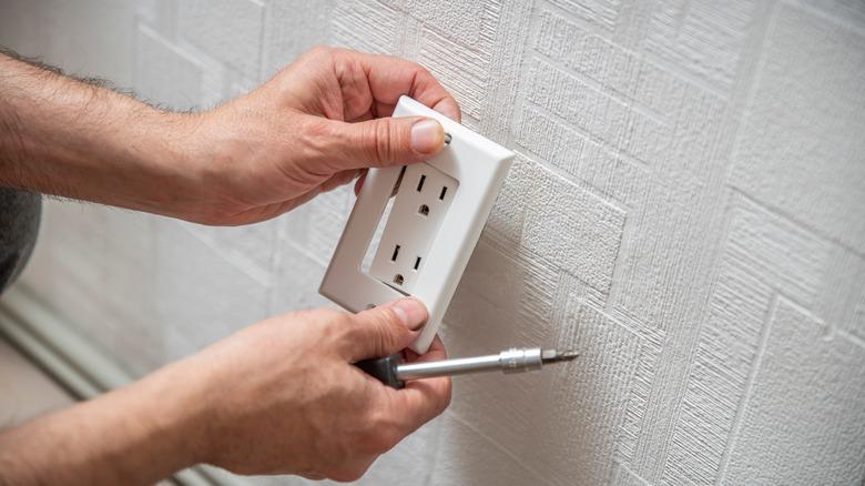 Installing receptacle in paneling