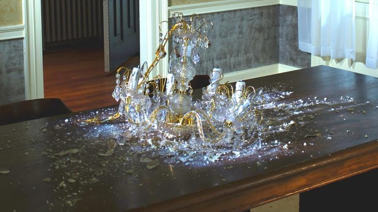 broken chandelier on table