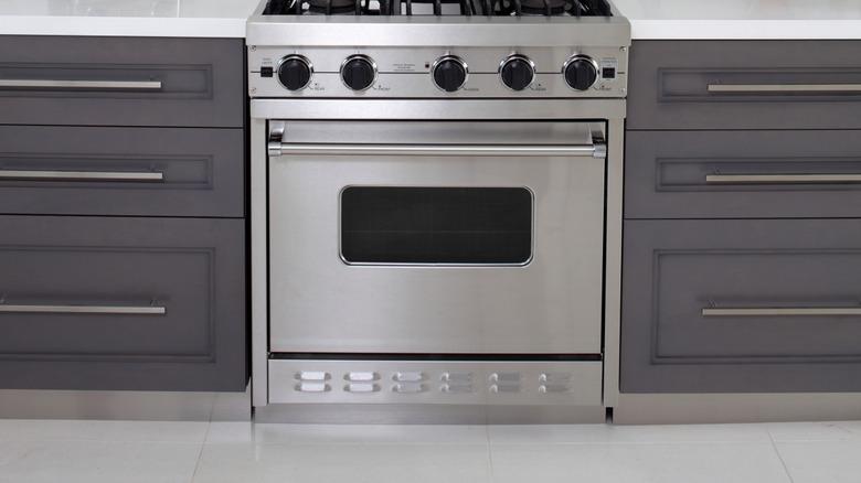 Stainless steel oven with warming drawer