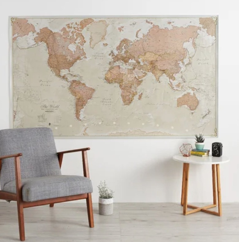 large world map hanging on the wall