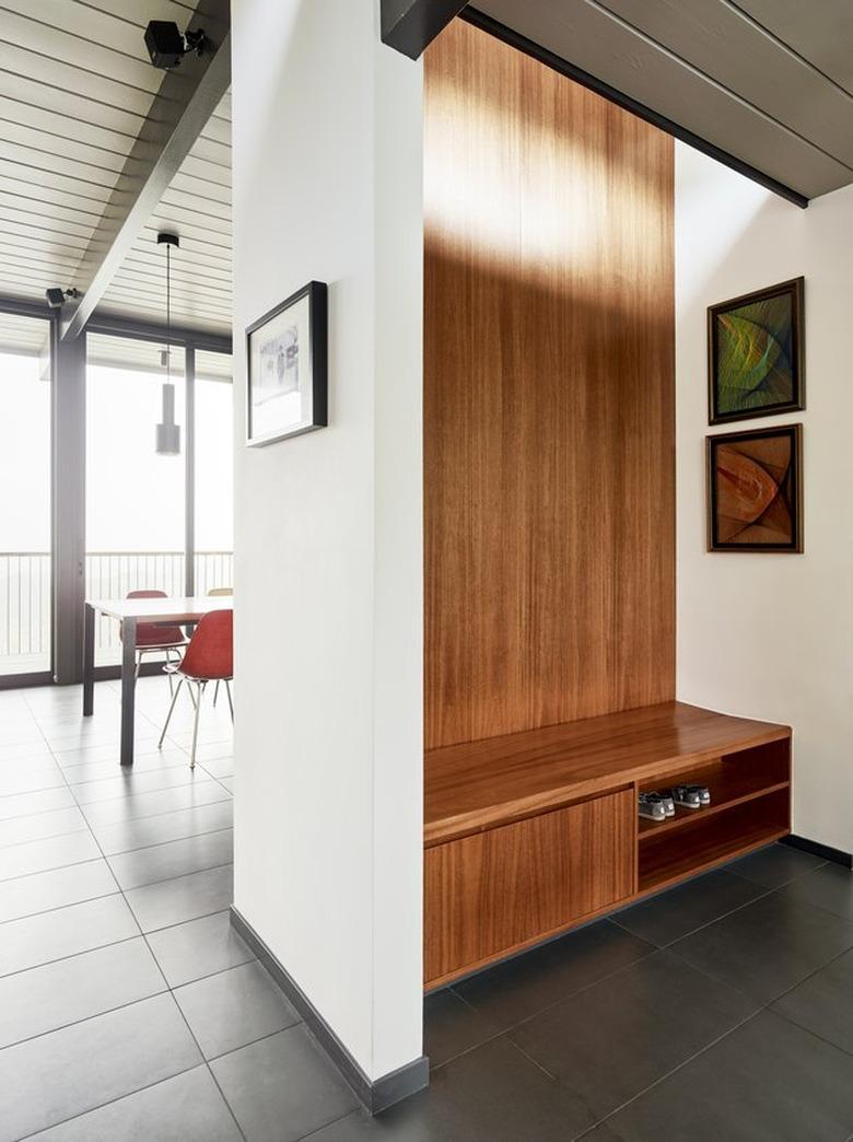 entryway bench with hidden shoe storage and skylight