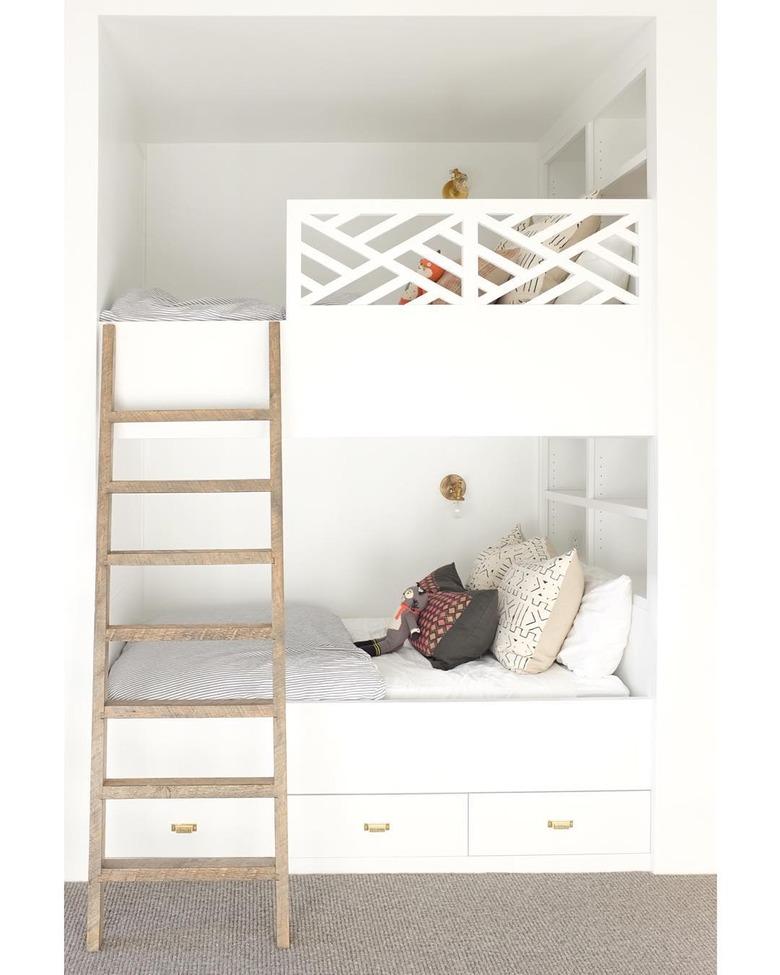 white bedroom with built in bunk beds