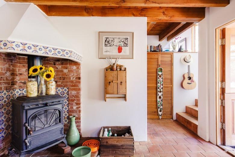 topanga canyon interior with terra cotta tile flooring and beamed ceiling