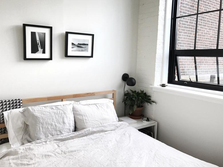 industrial bedroom with black steel frame windows