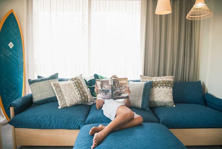 girl on blue couch