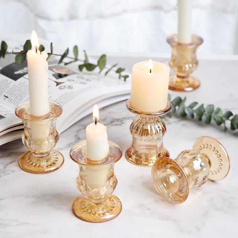 candle holders in amber glass