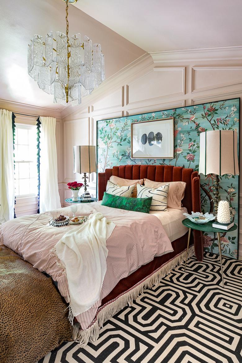 art deco bedroom with a graphic rug, hand painted screen