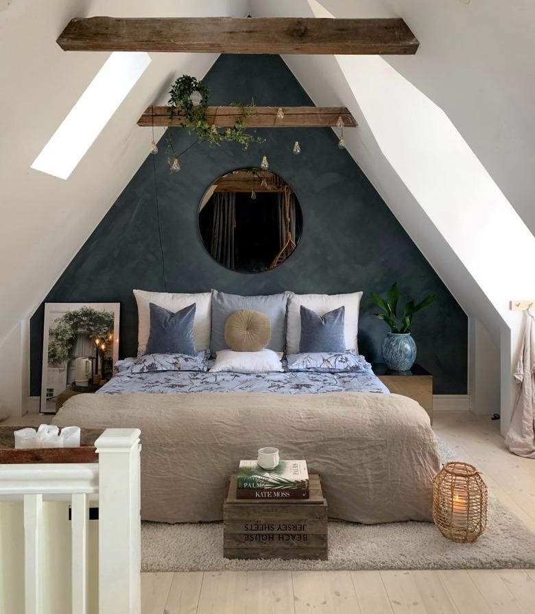 rustic attic bedroom lighting ideas wrapped around beams