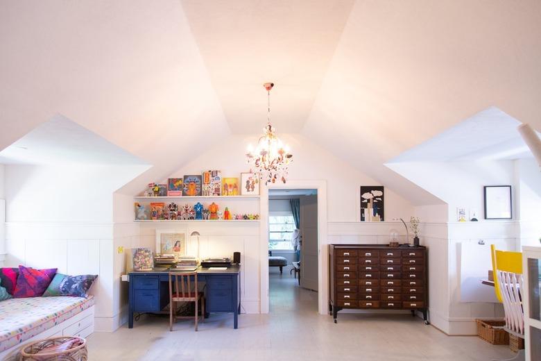 attic idea with office and seating area and chandelier