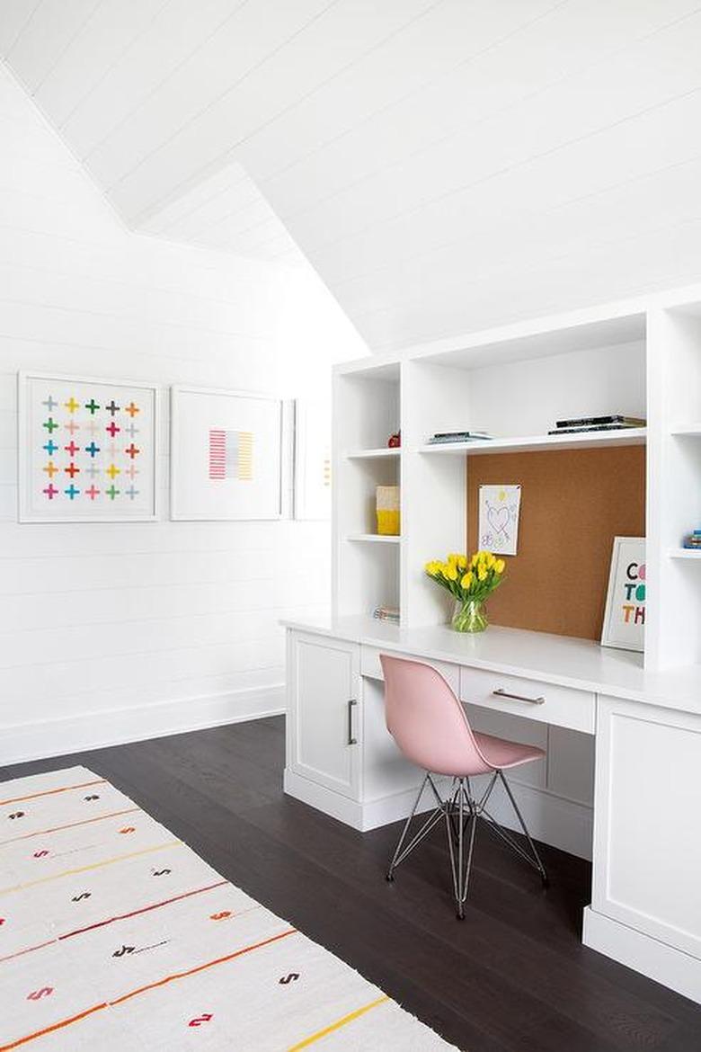 white attic idea with office and pink chair