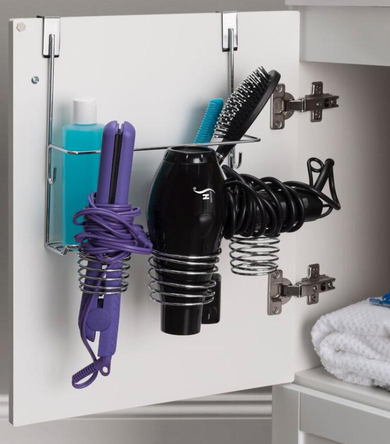 Steel cabinet hairdryer holder.