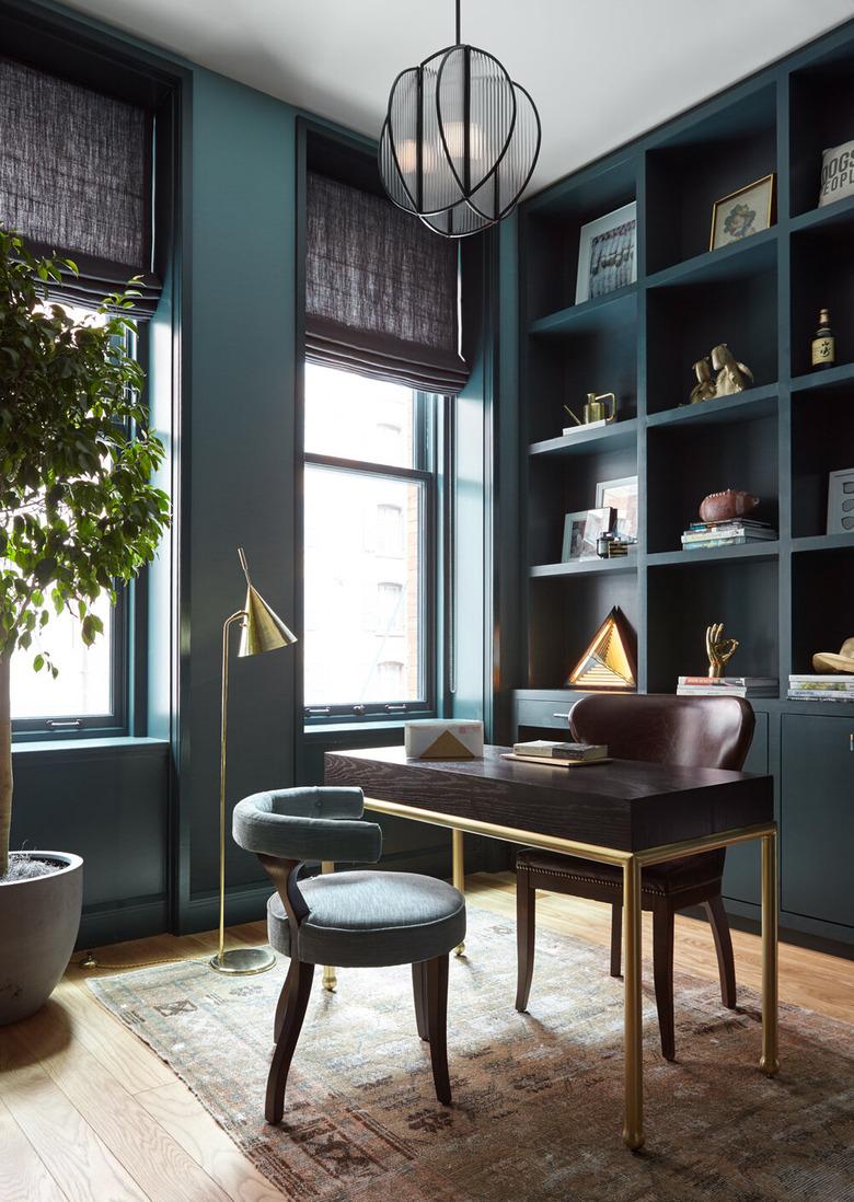 bauhaus colors in living room with teal walls