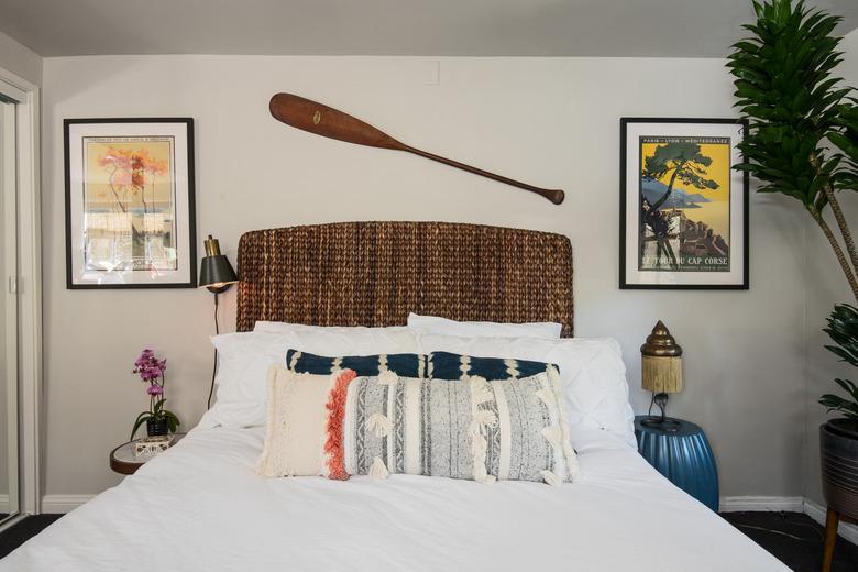 Bedroom with oar over the headboard