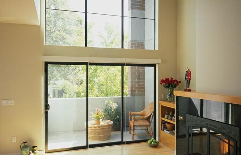 Image of glass patio doors from the inside looking out to a balcony