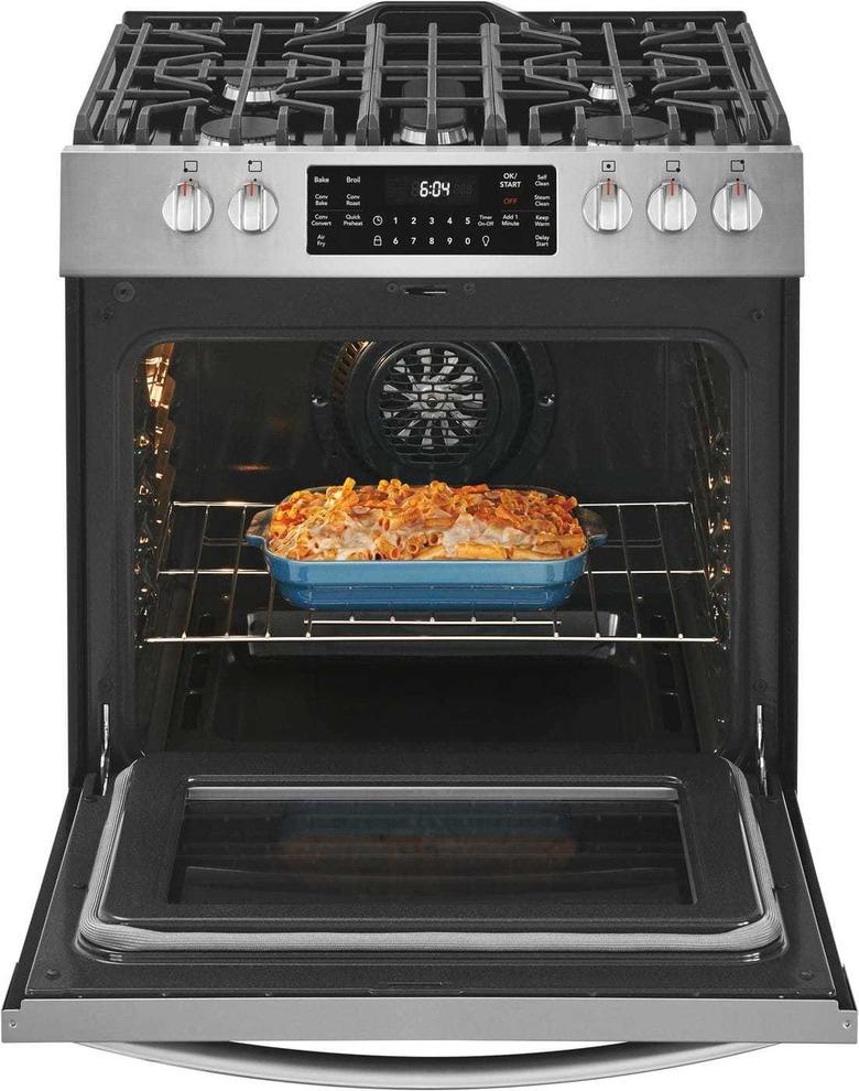 stove brand Frigidaire open stove with mac and cheese inside