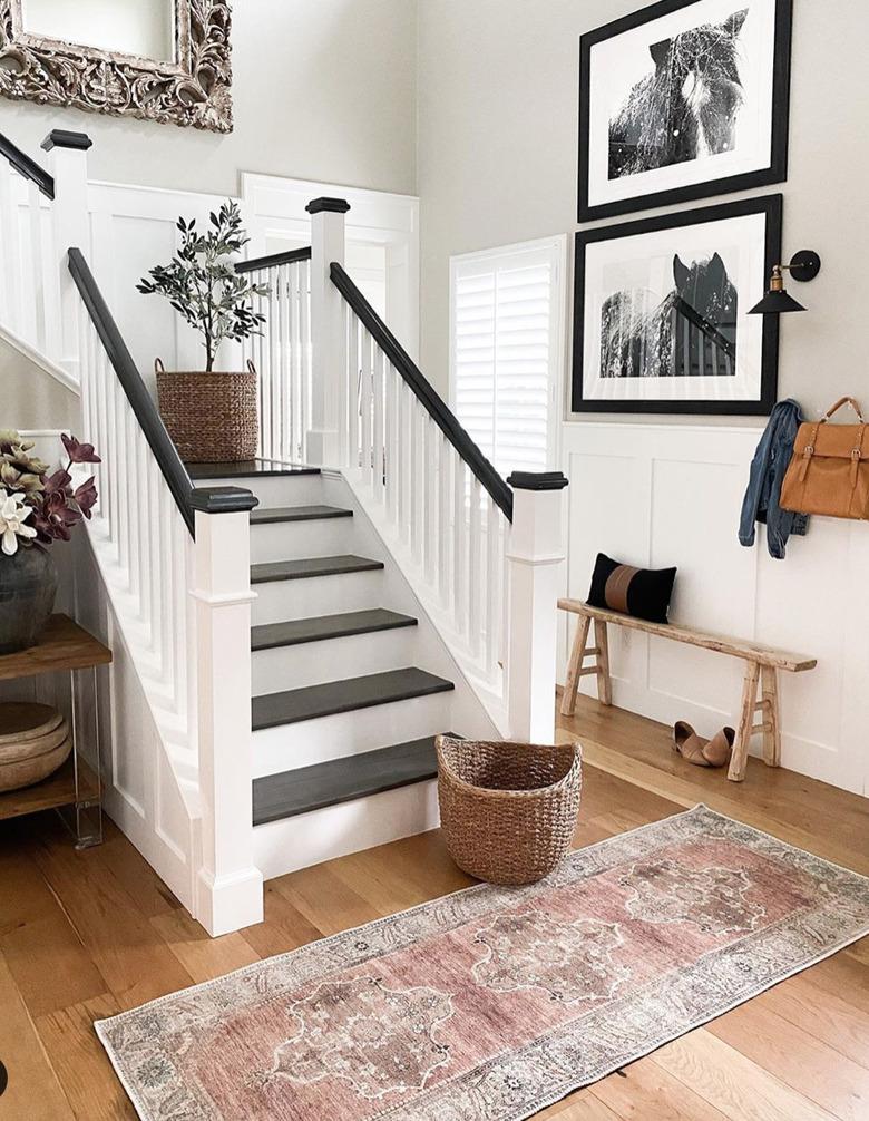 traditional black and white stairs with traditional details