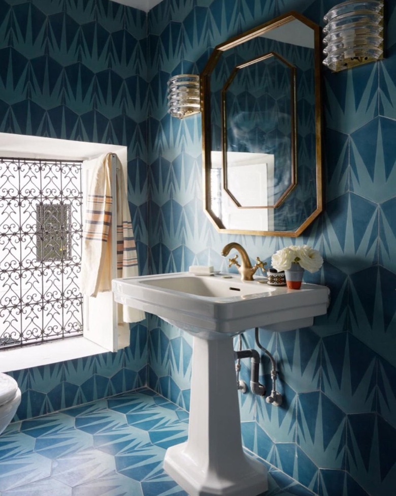 blue patterned hex tile with art deco accents