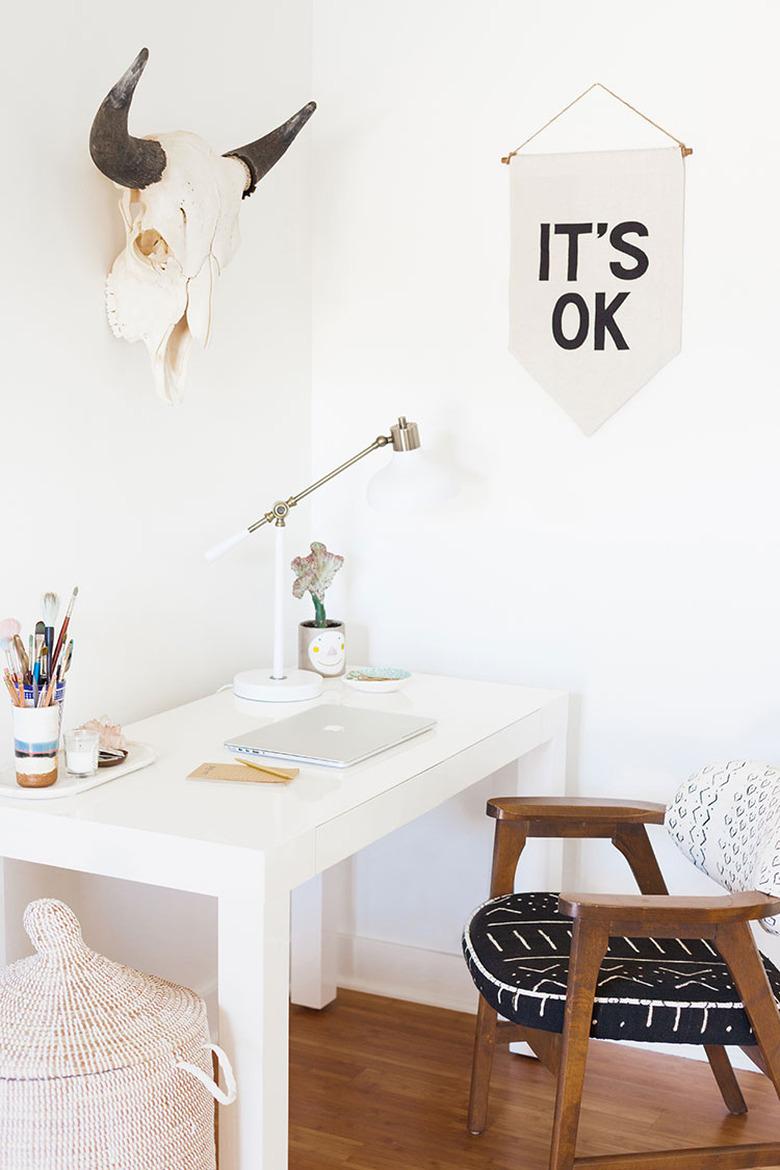 Boho office with banner and white desk