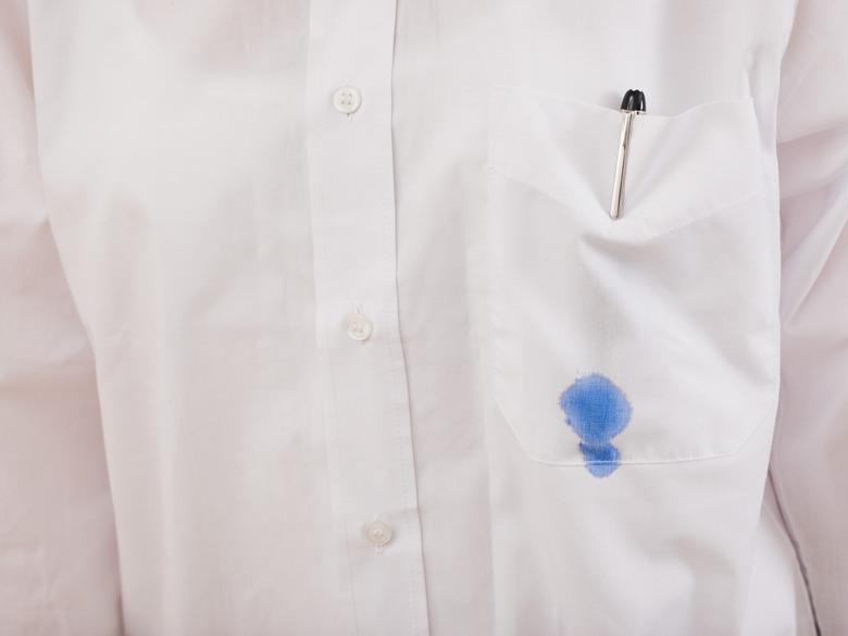 Ink spot on white shirt.