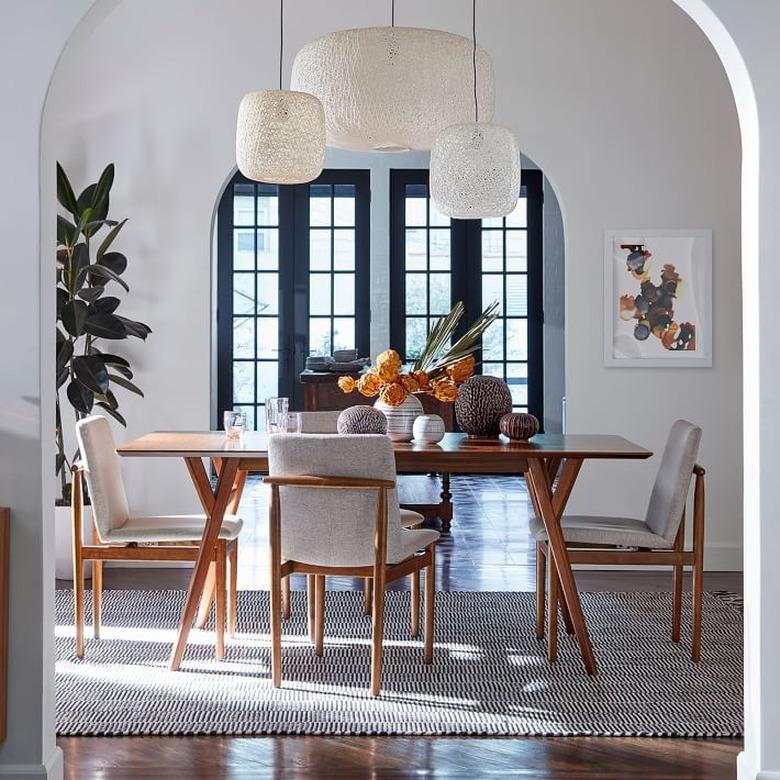 Ceiling Fixture Dining Room Lighting idea above wood table with chairs