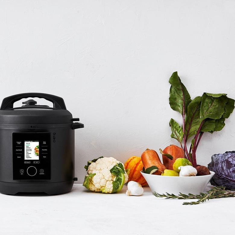 CHEF iQ smart cooker with raw veggies on table