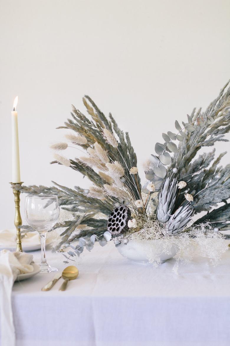 Glittery dried flowers and grass painted gray for Christmas centerpiece