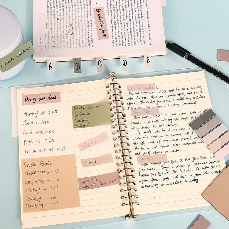 colorful sticky notes in notebook