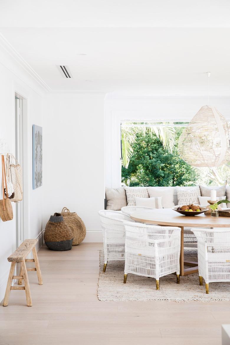 round table in neutral coastal dining room