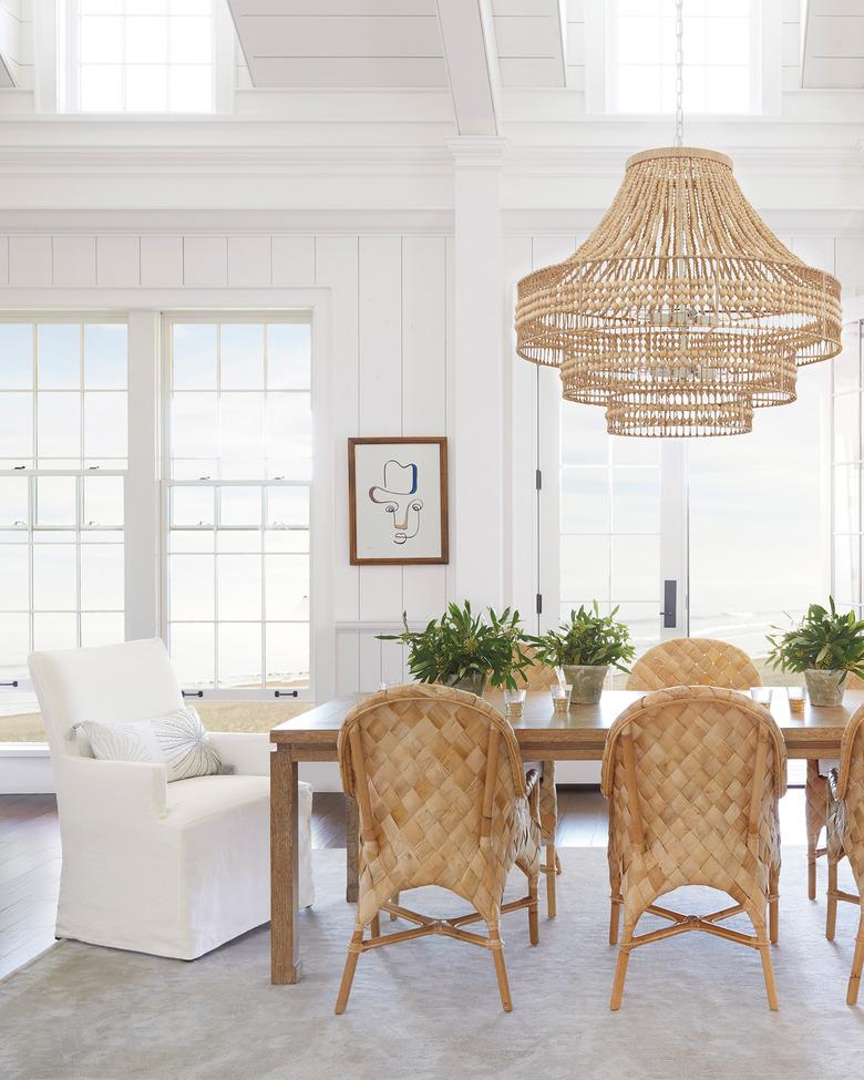 coastal dining room lighting with Serena & Lily ventana chandelier, coconut beads and abaca