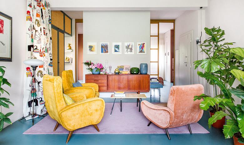 colorful living room with velvet furniture