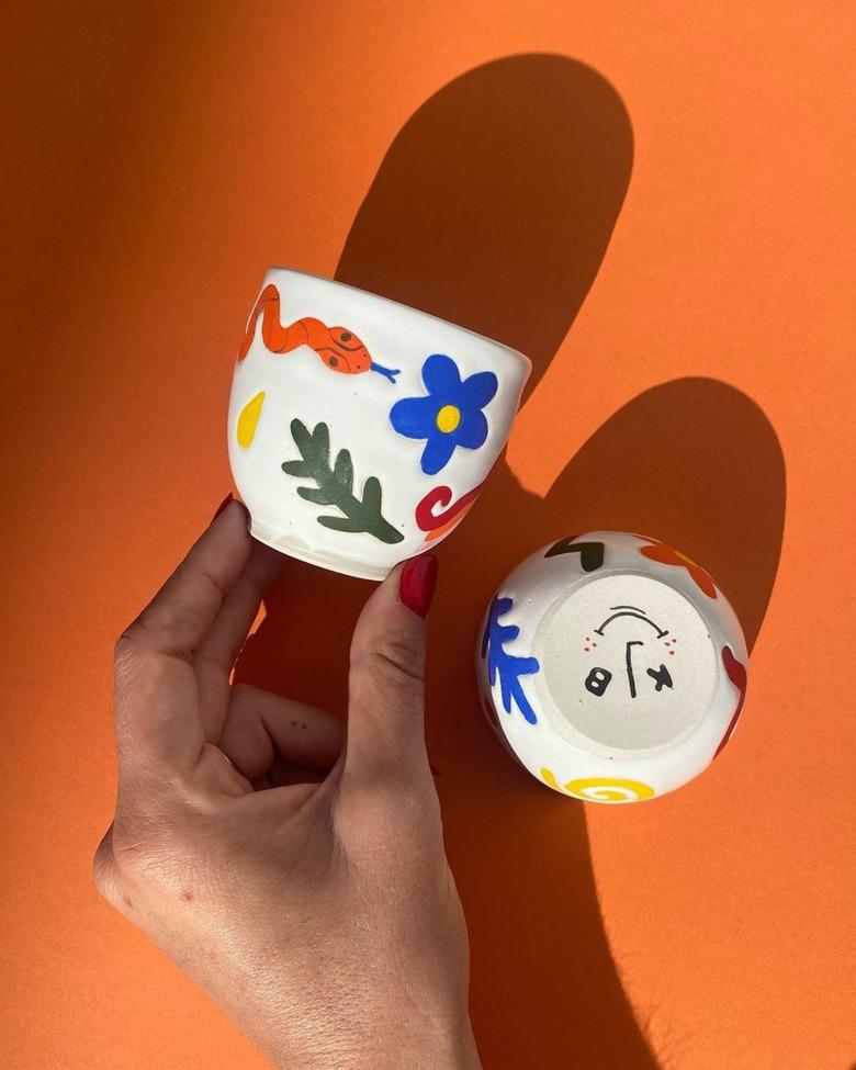 Contemporary Ceramics coffee cups with bright colorful illustrations