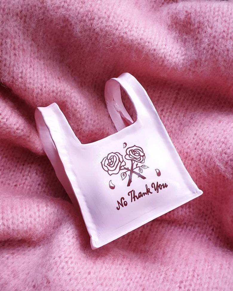 Contemporary Ceramics pink air clay bag with rose illustration