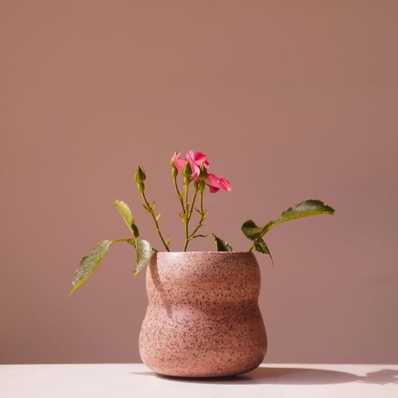Contemporary Ceramics organic pink speckled ceramic plant pot with pink flowers