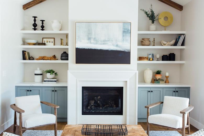 Simple white contemporary fireplace mantel by Michelle Lisac Interior Design