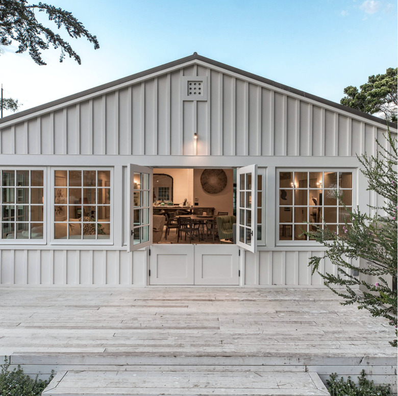 greige contemporary ranch home with casement windows