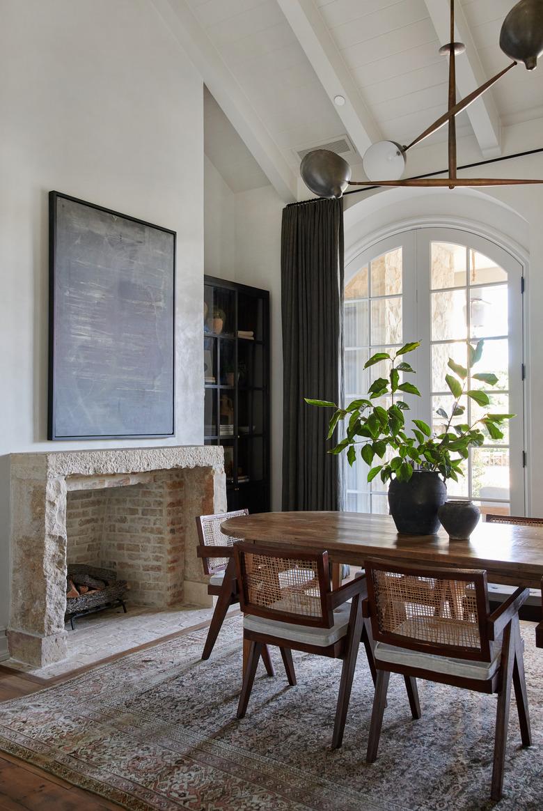 Contemporary Window Treatments Tall slate gray drapes in a dining room designed by Amber Interiors