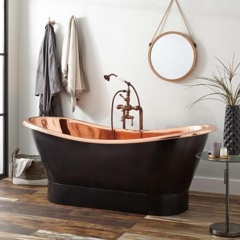 Freestanding copper bathroom faucet and tub