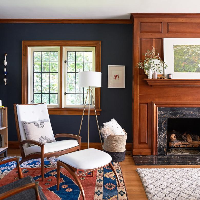 Craftsman living room with wood fireplace and modern furniture