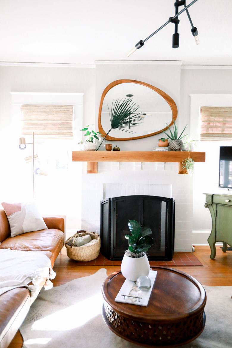 Craftsman living room with modern, geometric decor and white walls