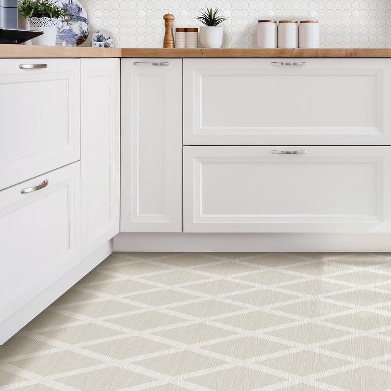 white kitchen cabinets with patterned cream floor