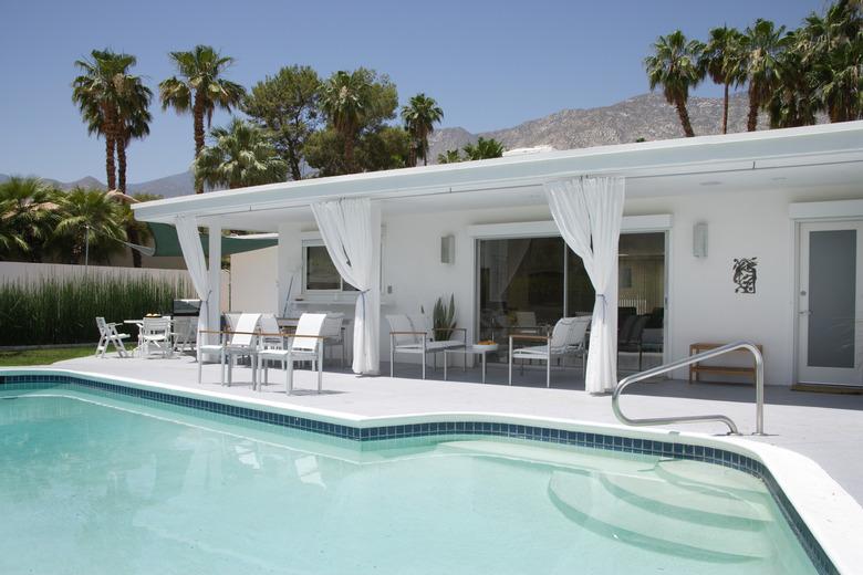 Pool and Patio Behind Mid-century Modern House