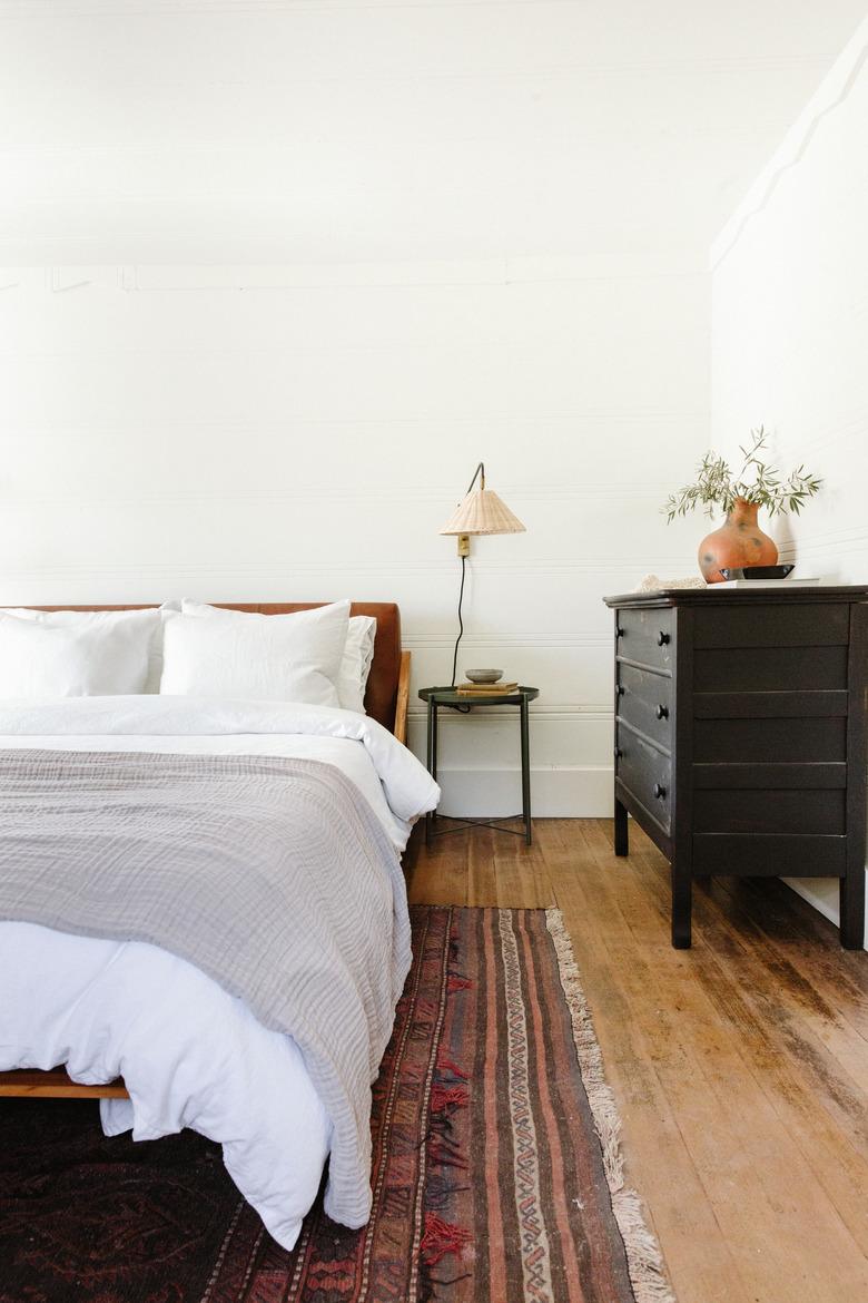 desert themed bedroom with terra cotta accessories