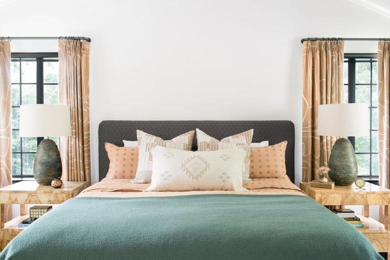 desert themed bedroom with elevated desert decor in turquoise and pink